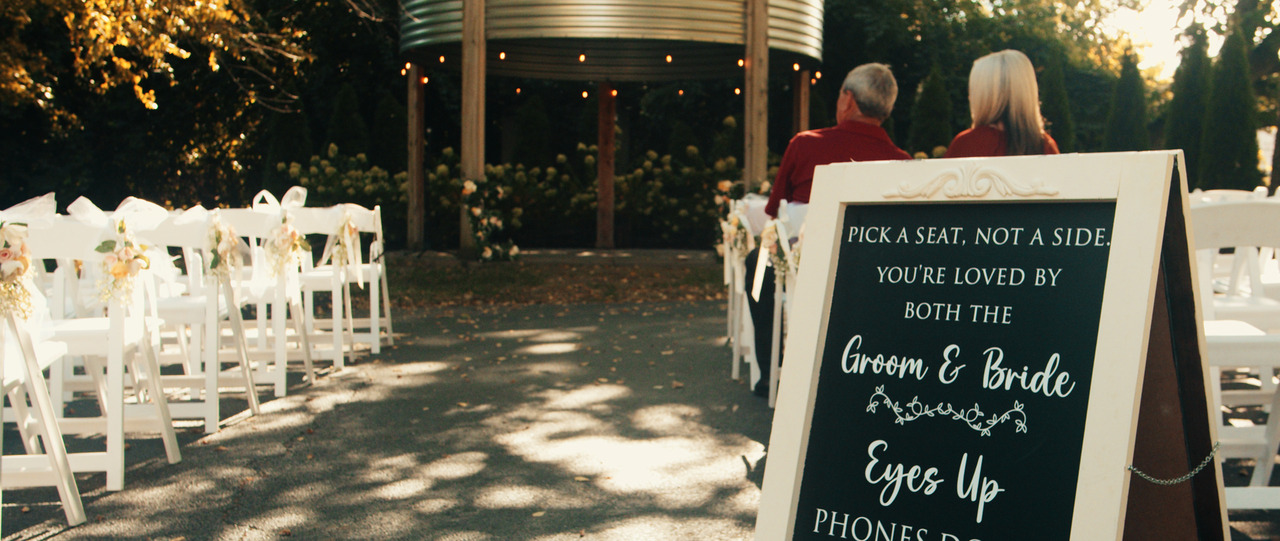 Outdoor wedding asile with gazebo altar.