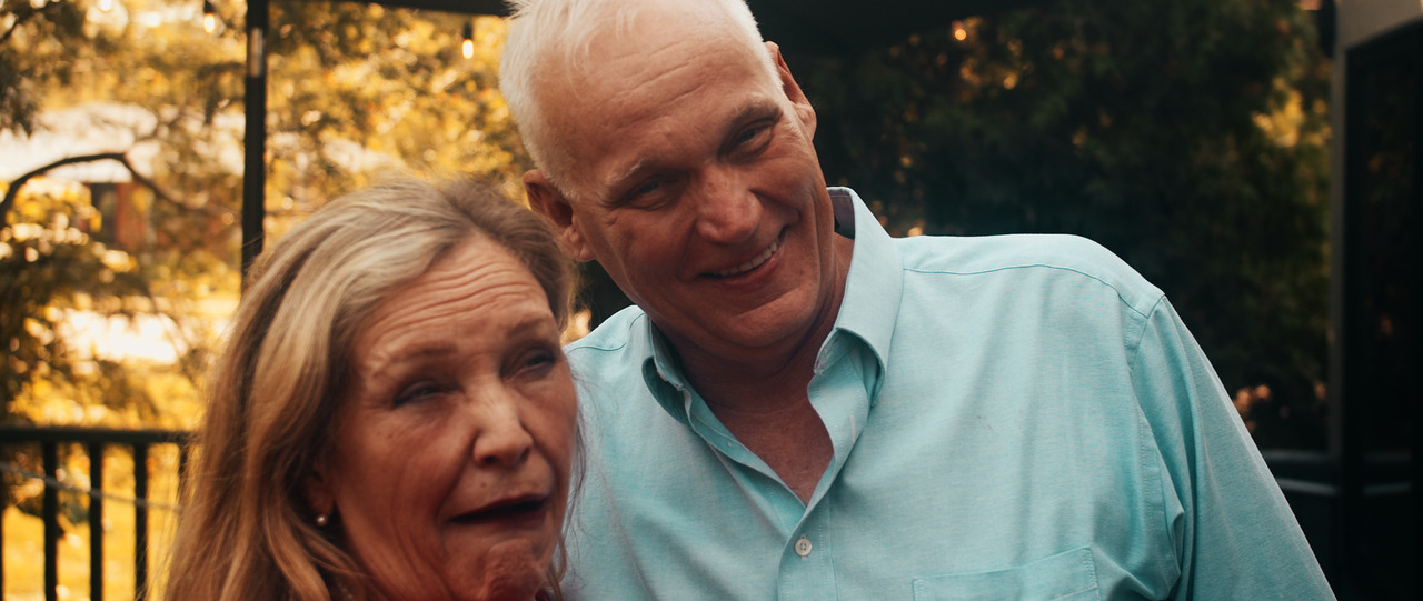 Bride and groom making funny faces.