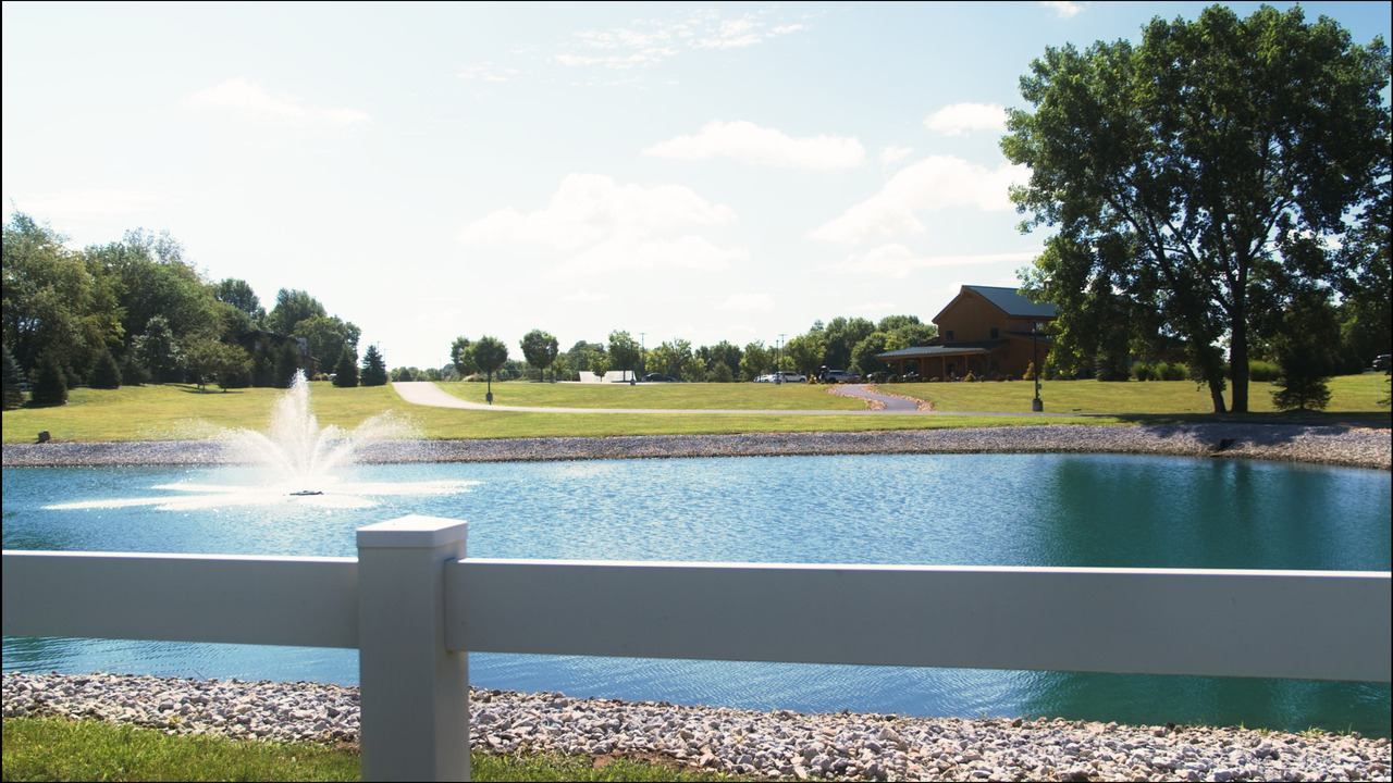 Large pond with fountain.