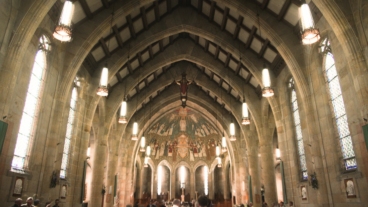Stone-vaulted church roof, seen from the entrance.