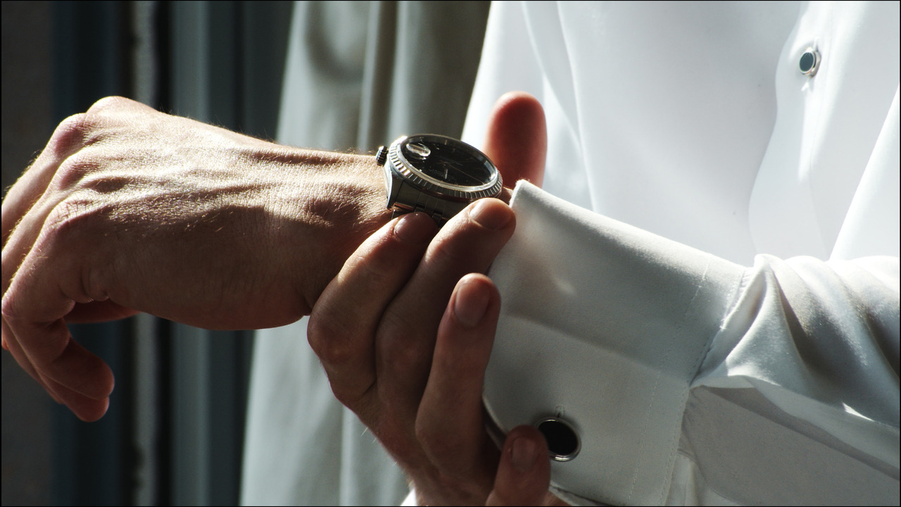 Closeup of groom's watch.