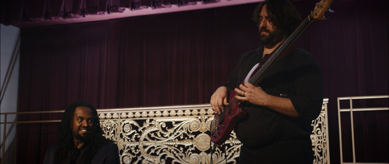 Guitarist and pianist play.