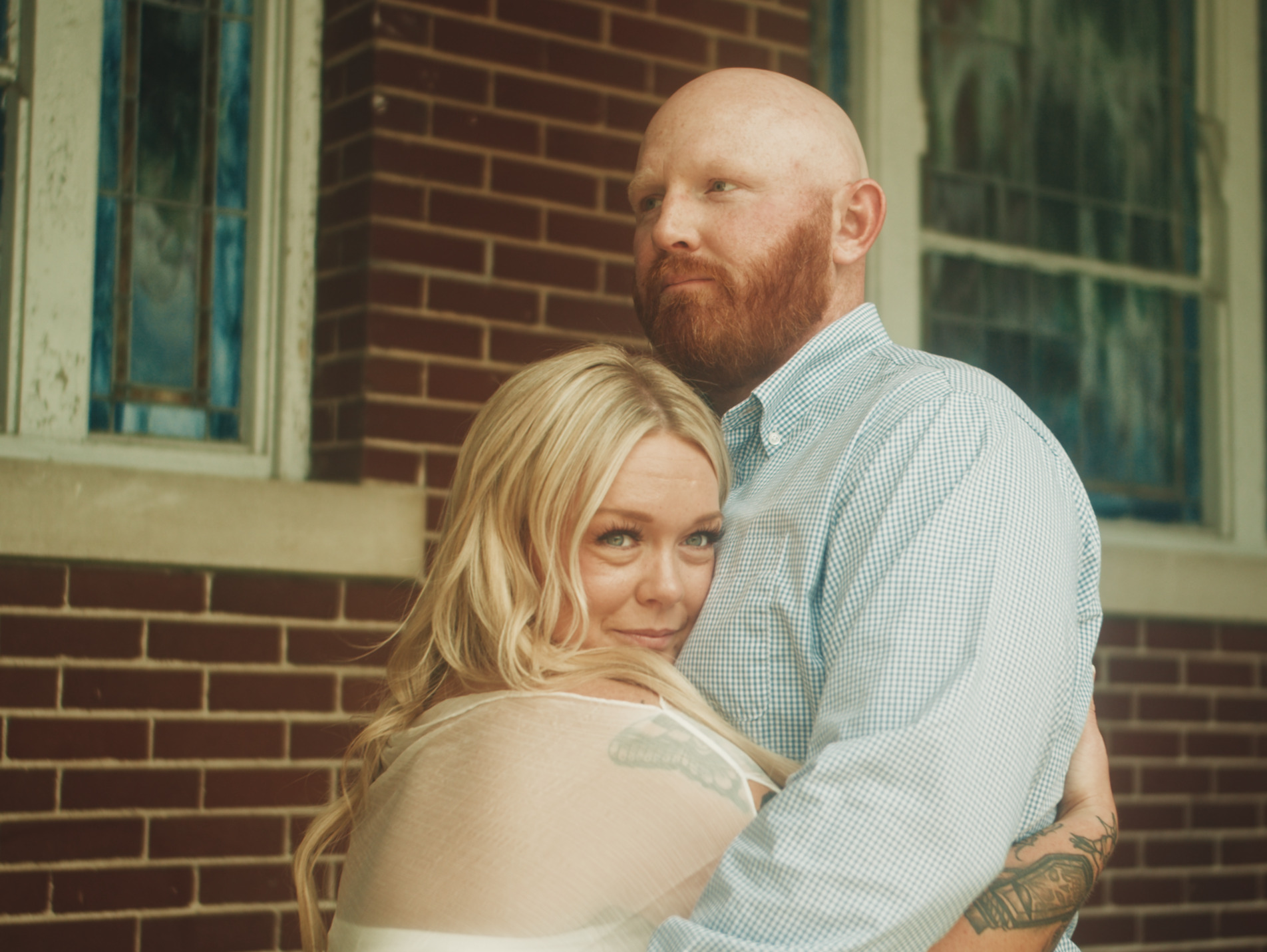 Couple hugging.